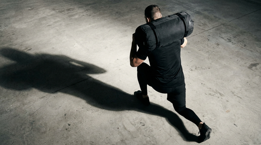 Sandbag Lunges Sans Blessure — HybridDept HYROX
