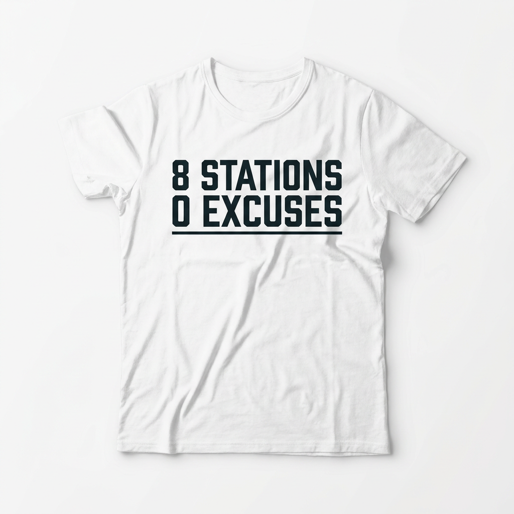 Tee 8 Stations 0 Excuses — flat lay light background | hybriddept